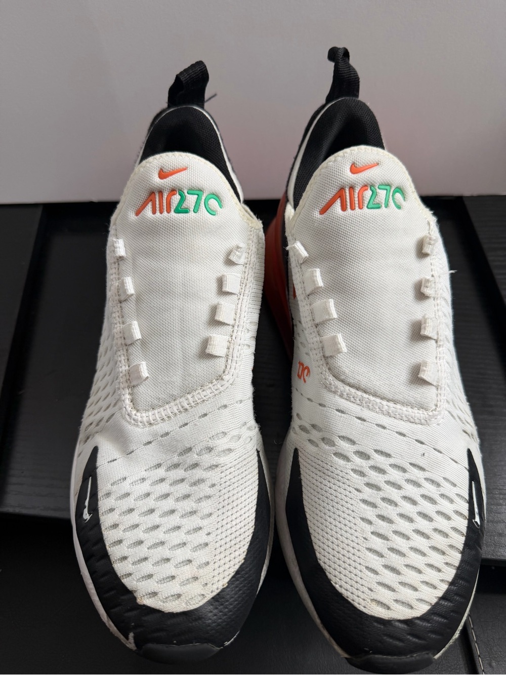 Nike Kids White Sneakers with Black, Orange and Green Accents